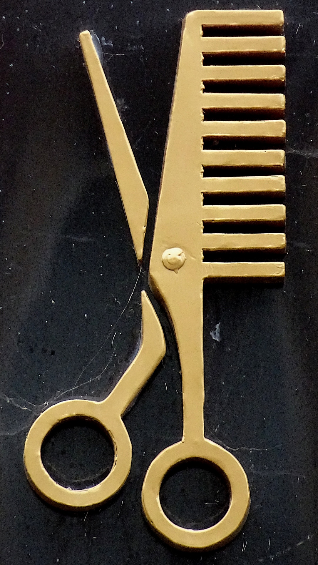 Hairdressers Scissors Comb Above Shop