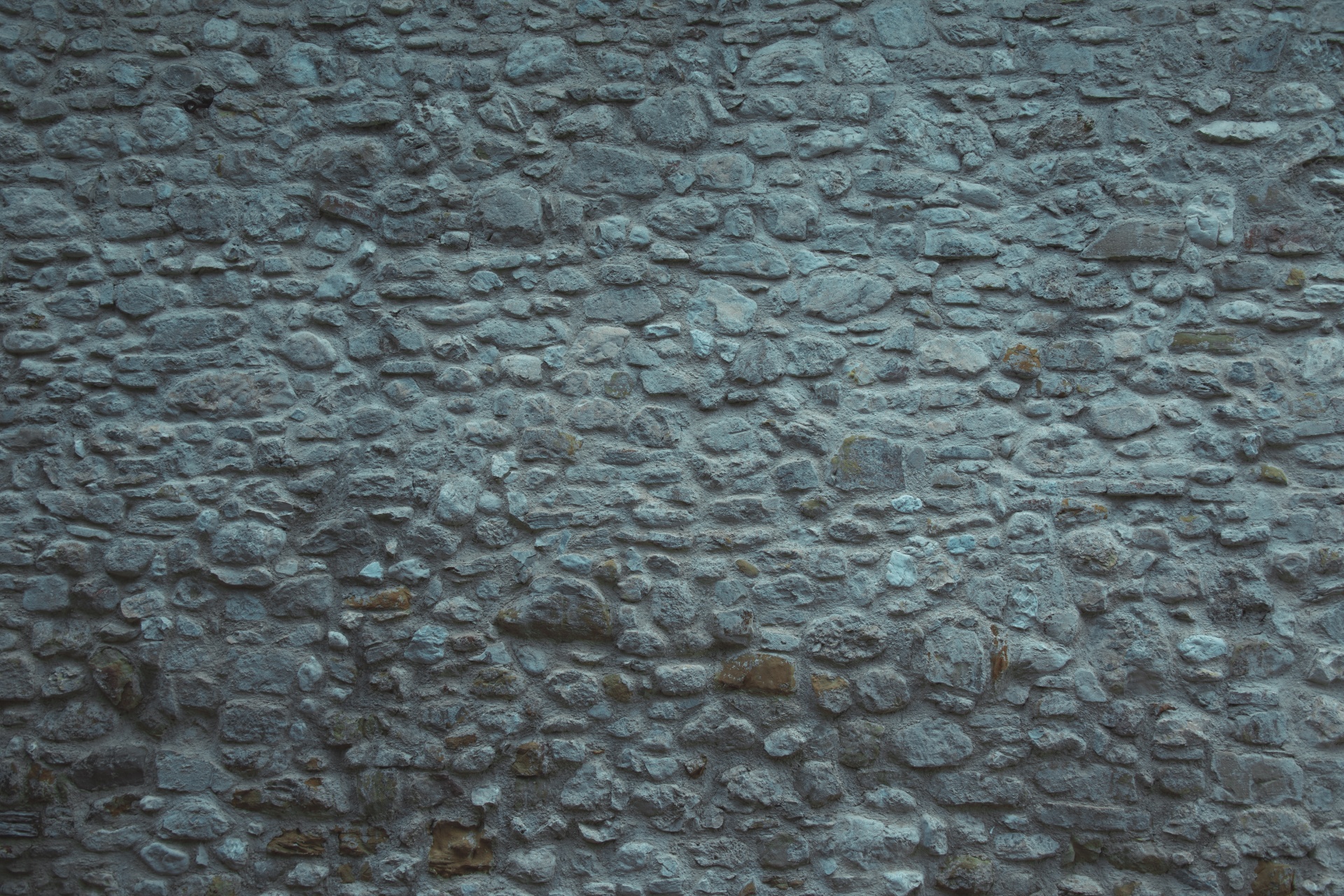 Old blue stone wall background