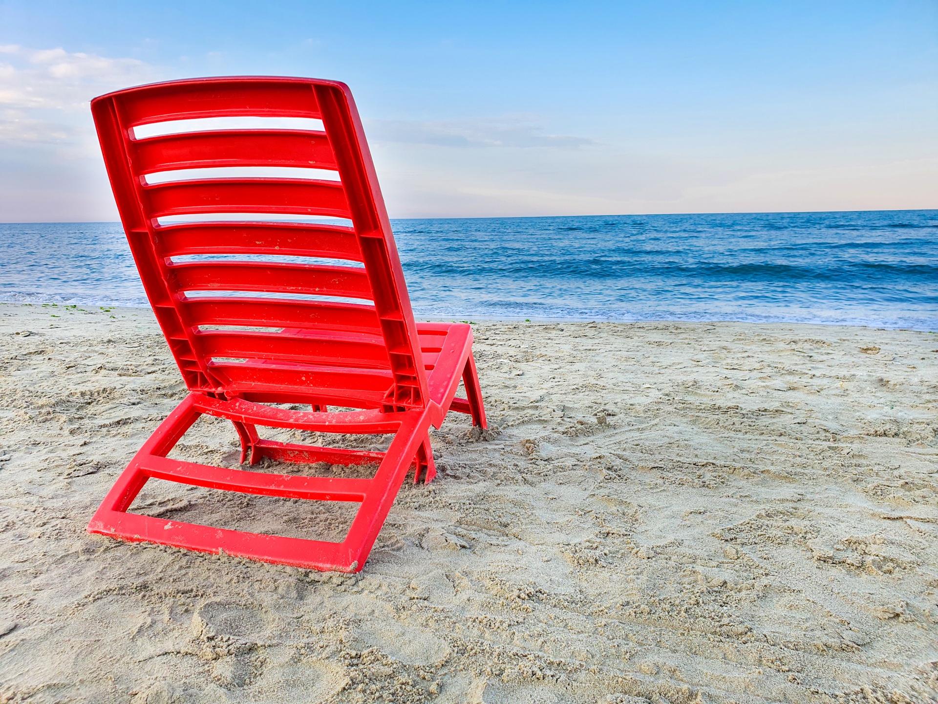 Red Beach Chair And Sea