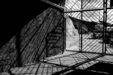 Black And White Gate With Shadows