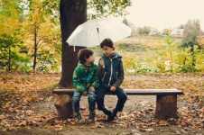 Children Under An Umbrella
