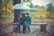 Children Under An Umbrella