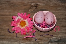 Easter Eggs And Flower On Wood