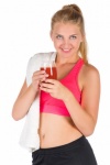 Fit Woman With Towel And Drink