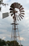 Mechanical Windmill On A Farm