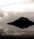 Reflected Image Of Trees And Sky