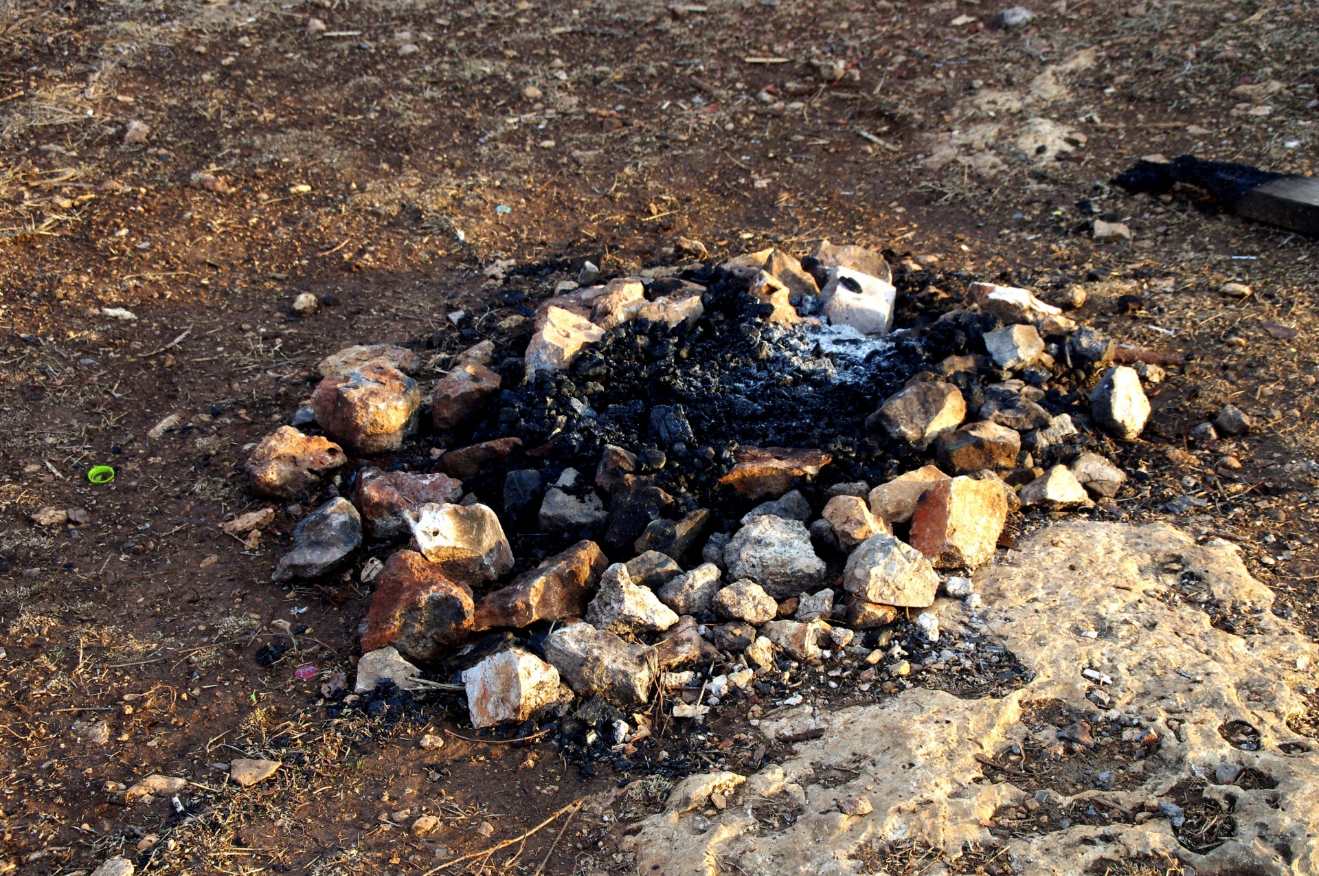 Dead campfire with stones in circle
