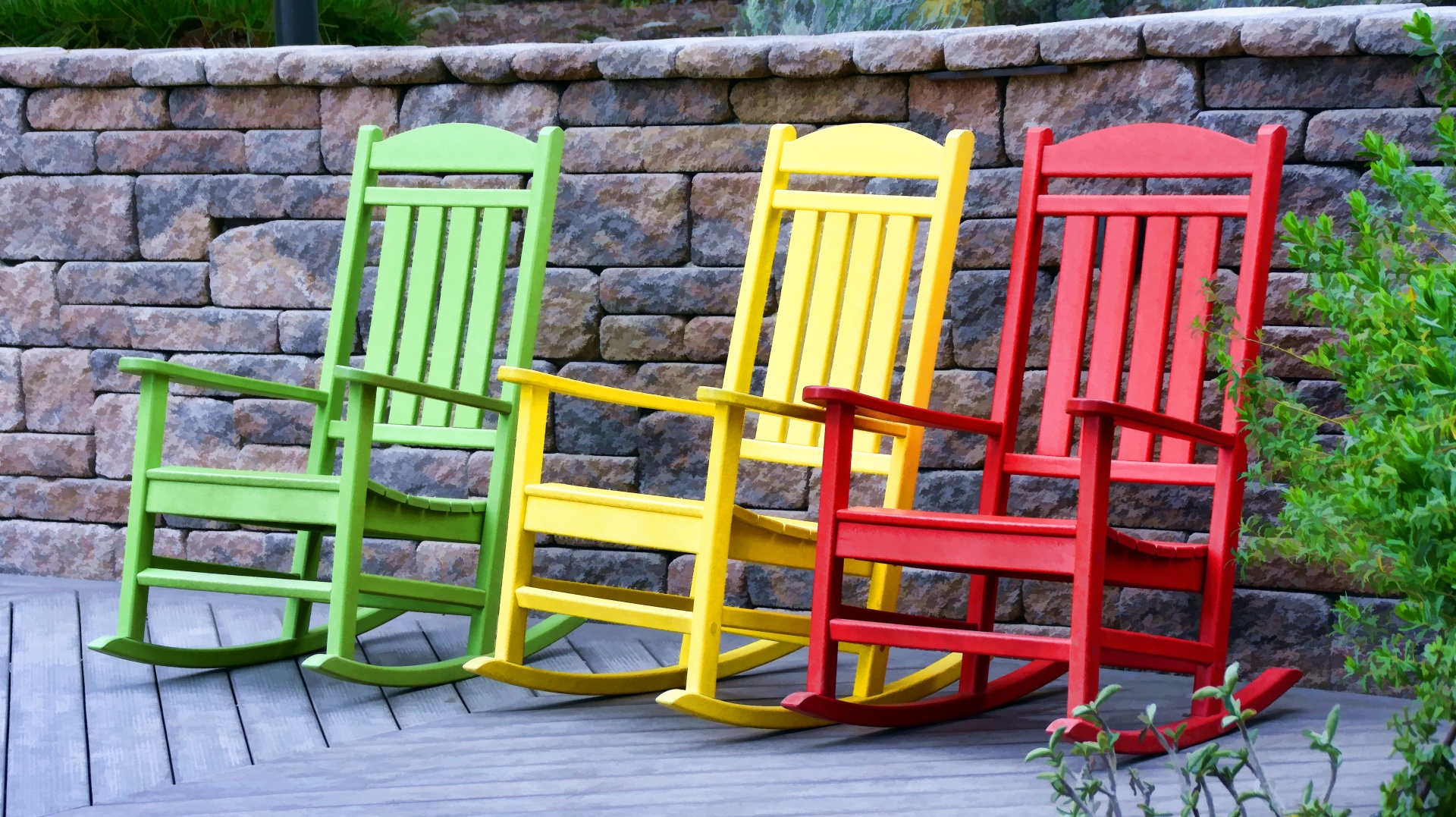 Three Colorful Rocking Chairs