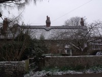 Snow On Thatched Roof