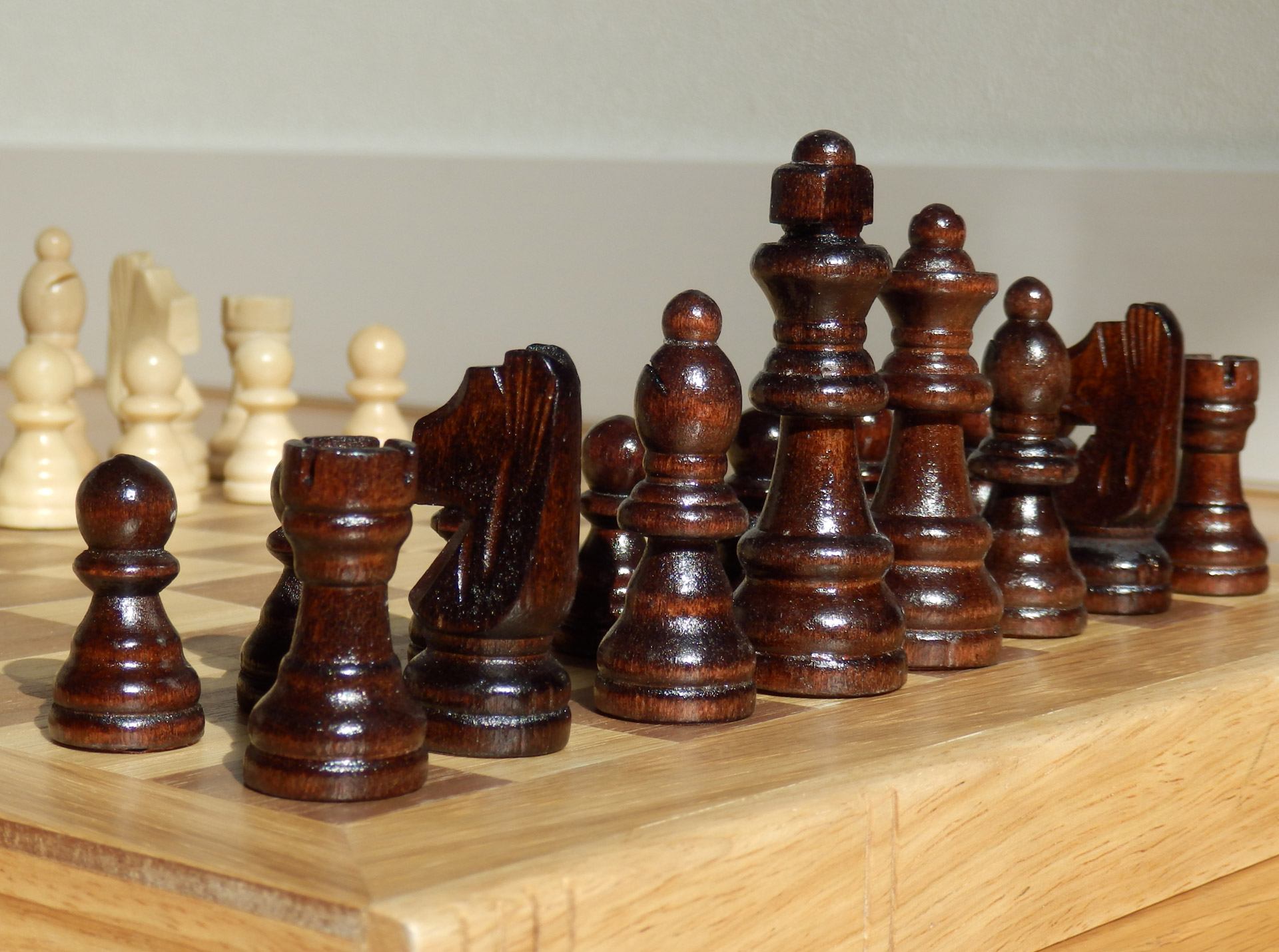 The black pieces of a chess set.