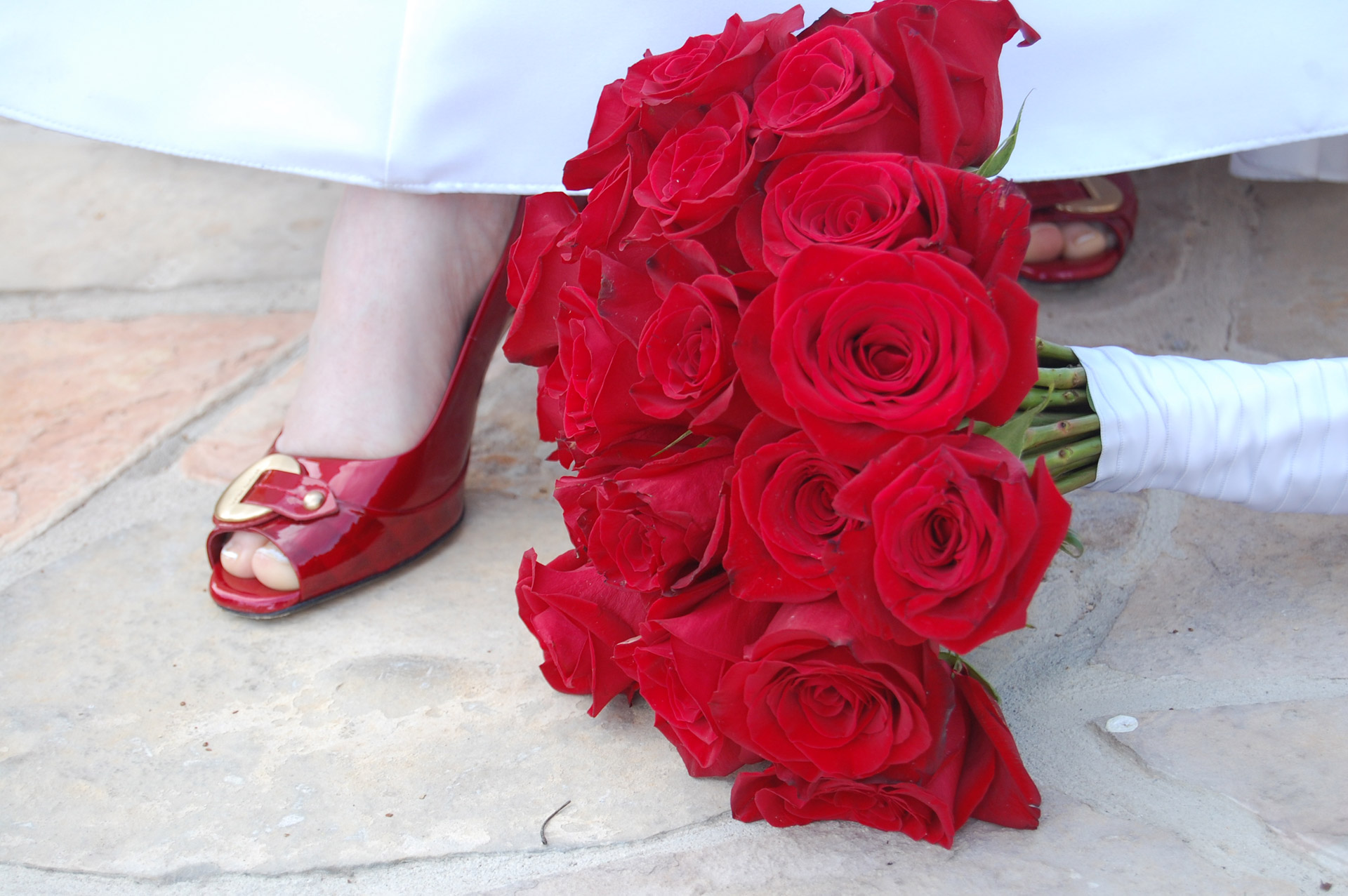 Red Shoe and Red Roses on Wedding day