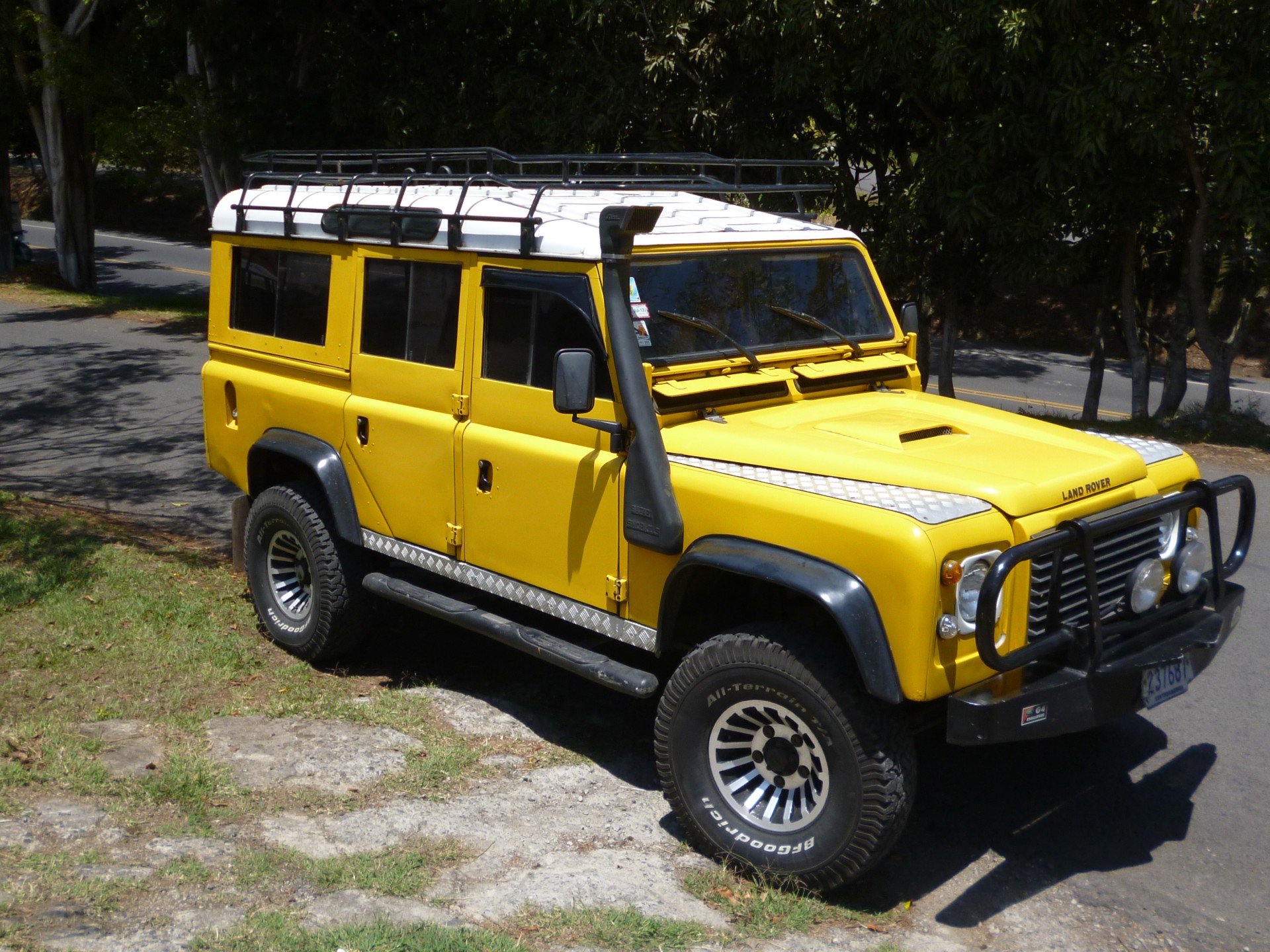Yellow Land Rover Defender
