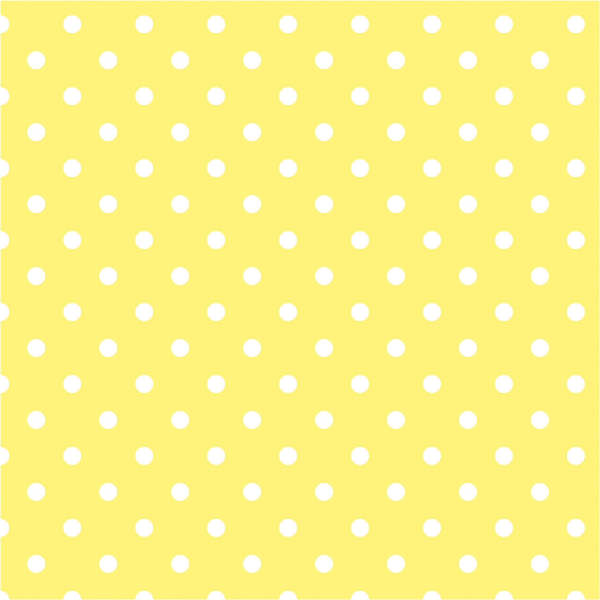 White polka dots on a yellow background of scrapbooking