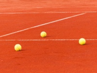 Clay Tennis Court With Balls