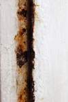 Flaking Paint And Rust Damage