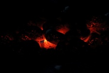 Glowing Embers Of A Charcoal Fire