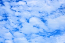 Loose White Clouds In Blue Sky