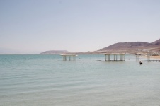 Rinsing Man In Dead Sea Landscape