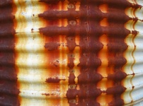 Rusted Corrugated Surface On Tank