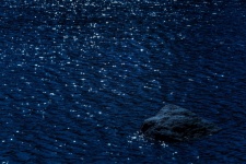 Stone In Water At Night