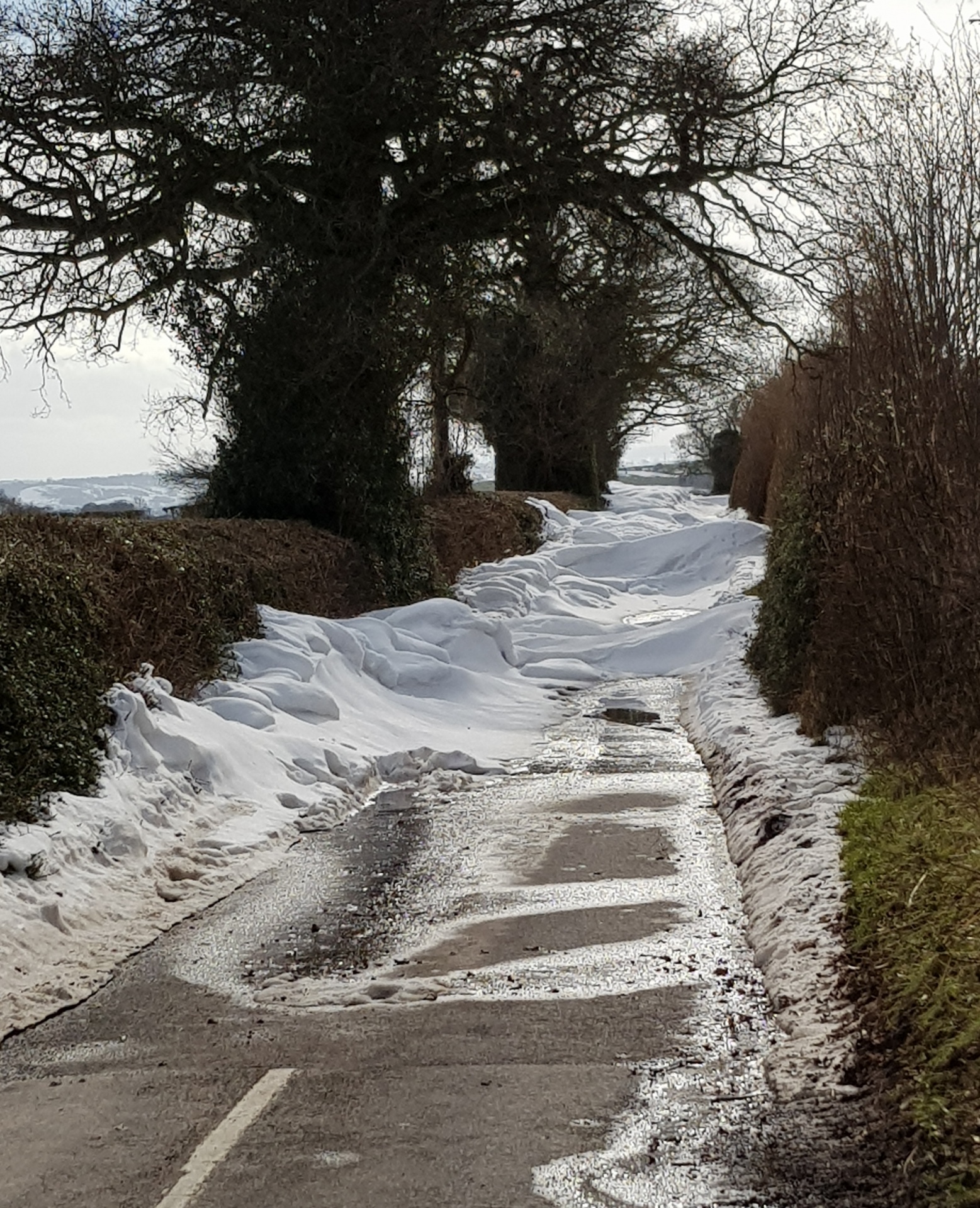 Snow blocking the road near Ludlow Shropshire UK