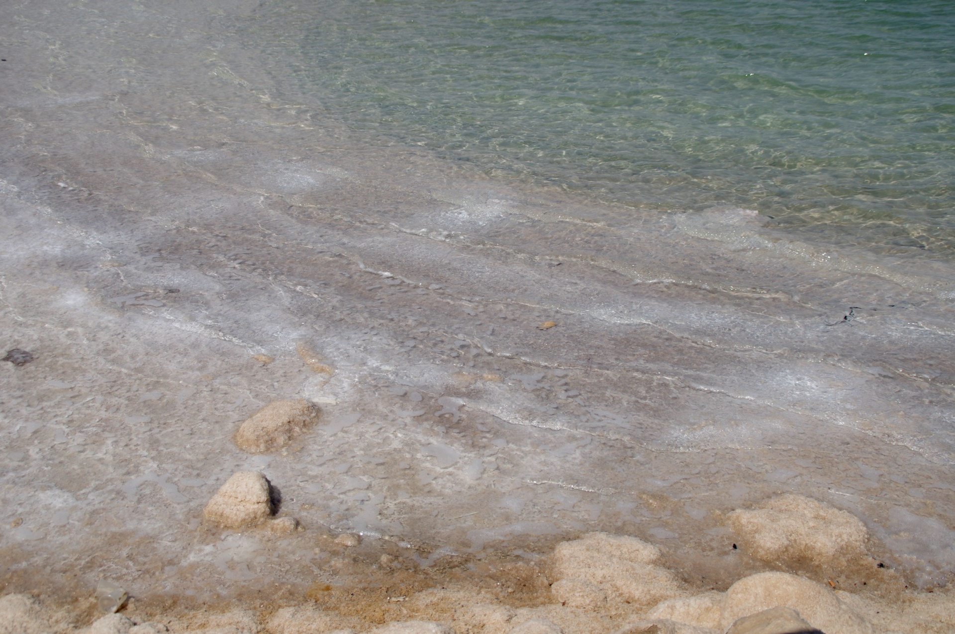 Waves And Salty Rocks At Dead Sea