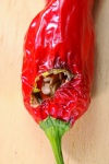 Edge On A Hole In A Red Chili