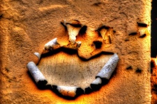 Ghoulish Face On A Wall Of Peeling