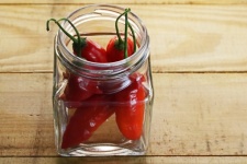 Red Chilis In A Glass Jar