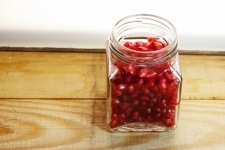 Red Pomegranate Pips In Glass Jar