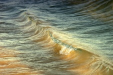 Breaking Waves At Sunset