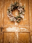 Christmas Wreath On An Old Door