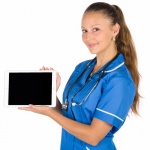 Female Doctor With A Tablet