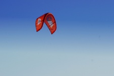 Red Surf Kite Against Blue Sky