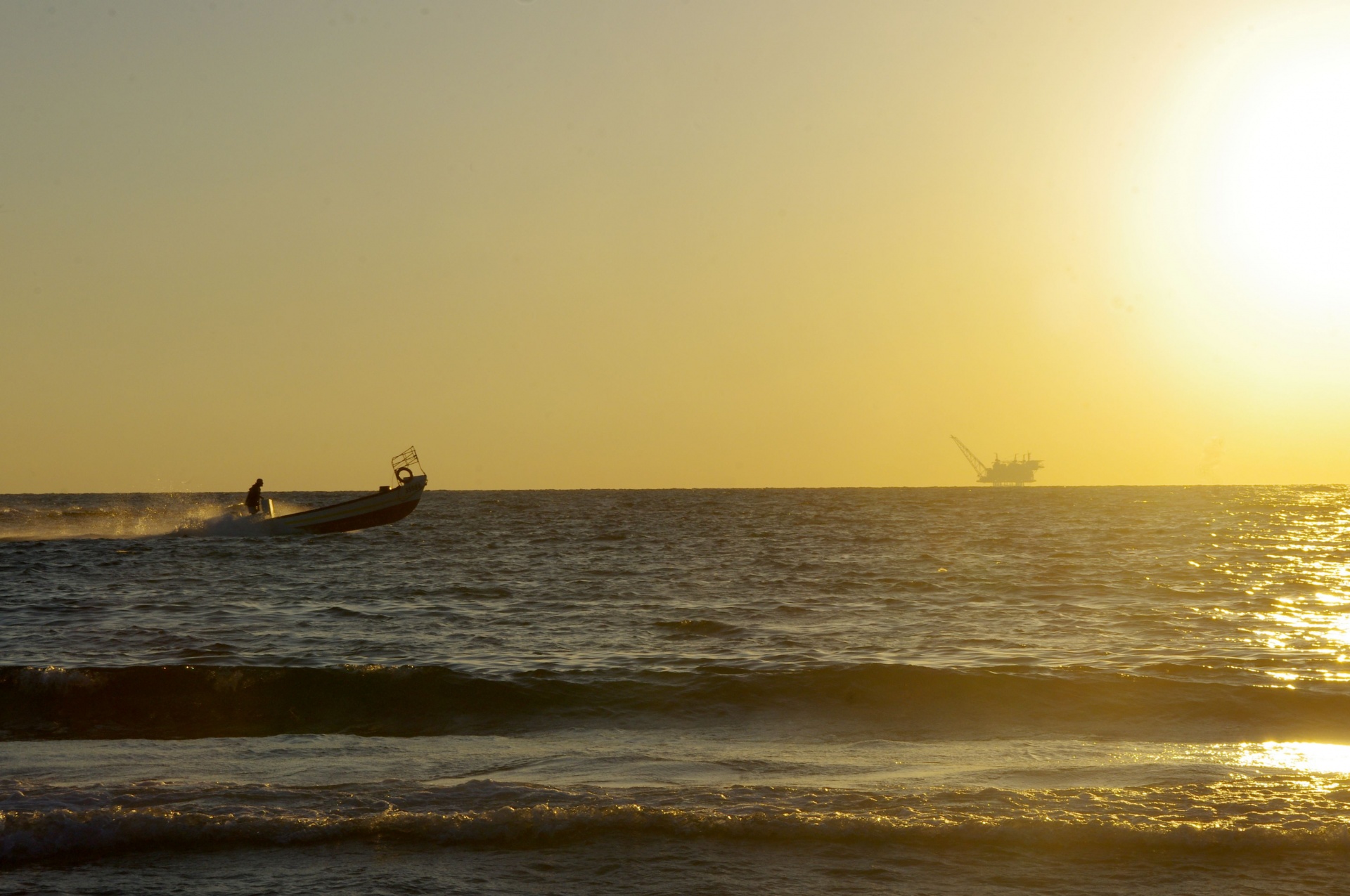 fishing-boat-racing-against-sunset-free-stock-photo-public-domain