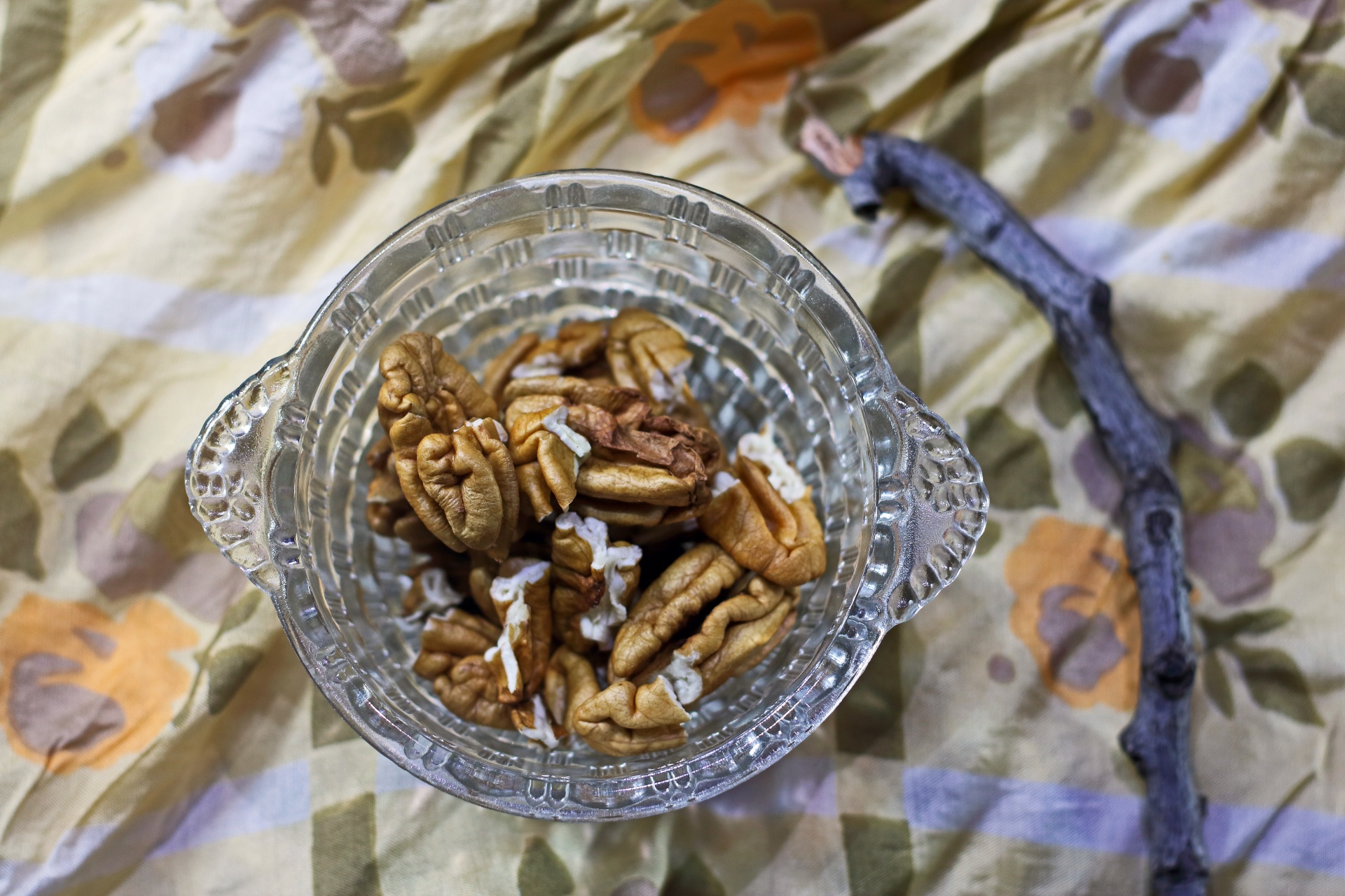 Raw Pecan Nuts In A Glass Bowl