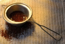 Old Strainer With Red Bush Tea