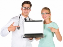 Doctor And Nurse With A Laptop