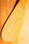 Light On A Wooden Spatula On Wood