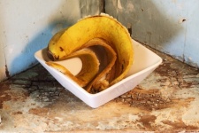 Limp Banana Peel In A Ceramic Bowl