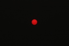 Red Sun On A Very Smokey Day