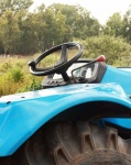 Steering Wheel Of A Blue Tractor