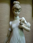 Woman Holding Puppy Dog Statuette