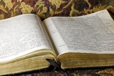 An Open Bible On A Textured Cloth