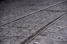 Old Rail Tracks In Cobblestone