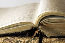 Light On Pages Of An Open Bible