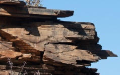 Layered Rock Slabs On A Hill