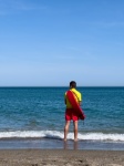 Lifeguard Watching On A Beach