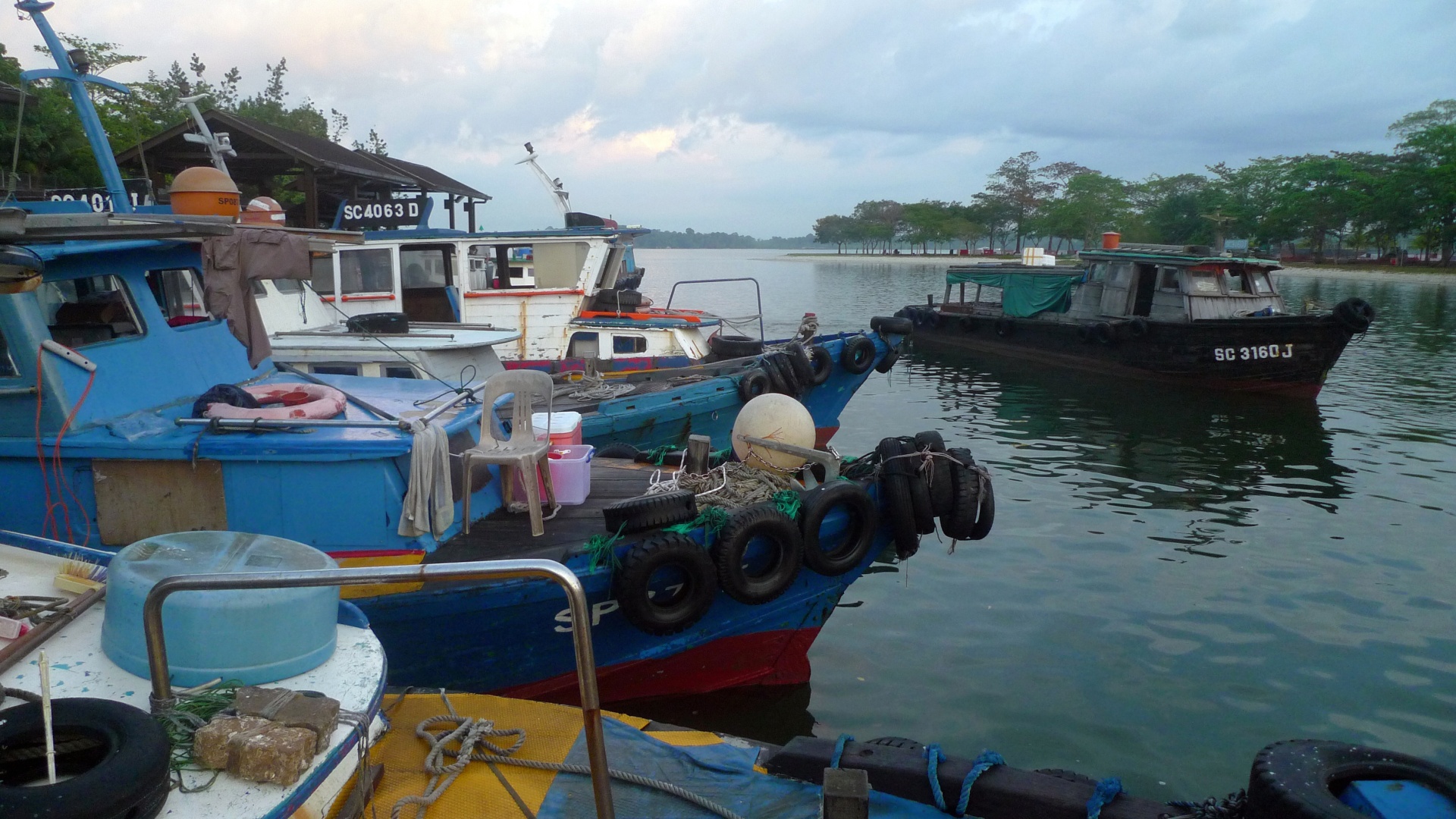 Boats at Changi Point Ferry Terminal on the north-east coast of Singapore Island. Boats from here sail to Ubin Island and locations in Johor state, Malaysia