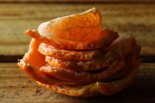 A Single Mandarin Wedge On Peels